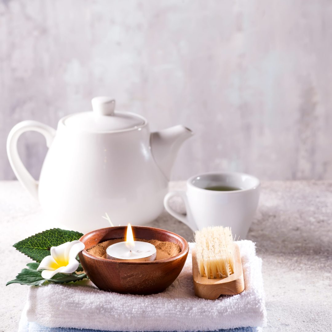 Beauty and spa concept with spa set on dark rustic stone background