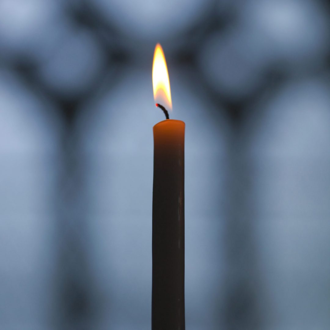 Flame of a candle in a church