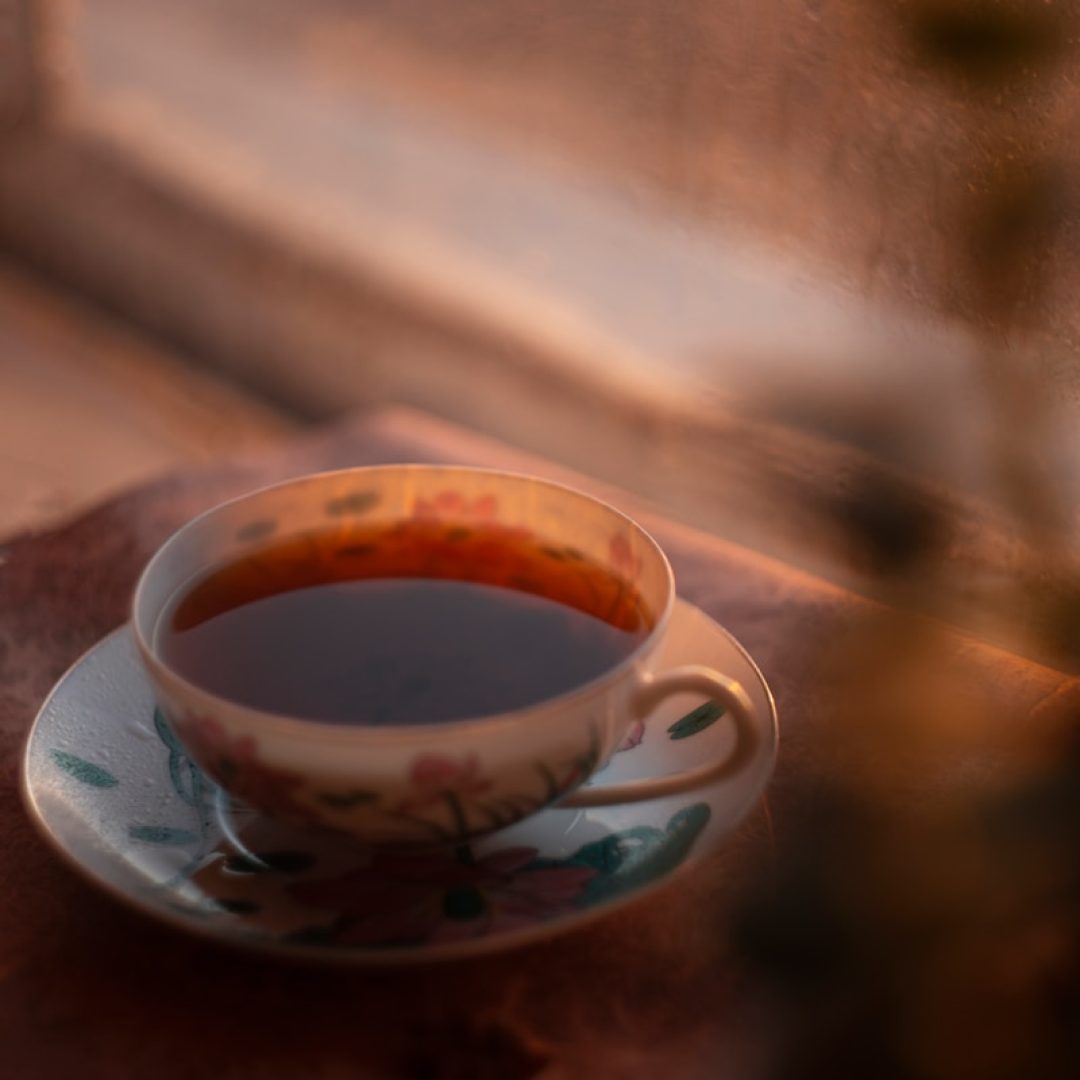 a cup of tea on a saucer