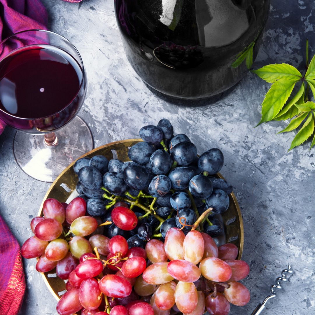 Glass with red wine from autumn grape variety